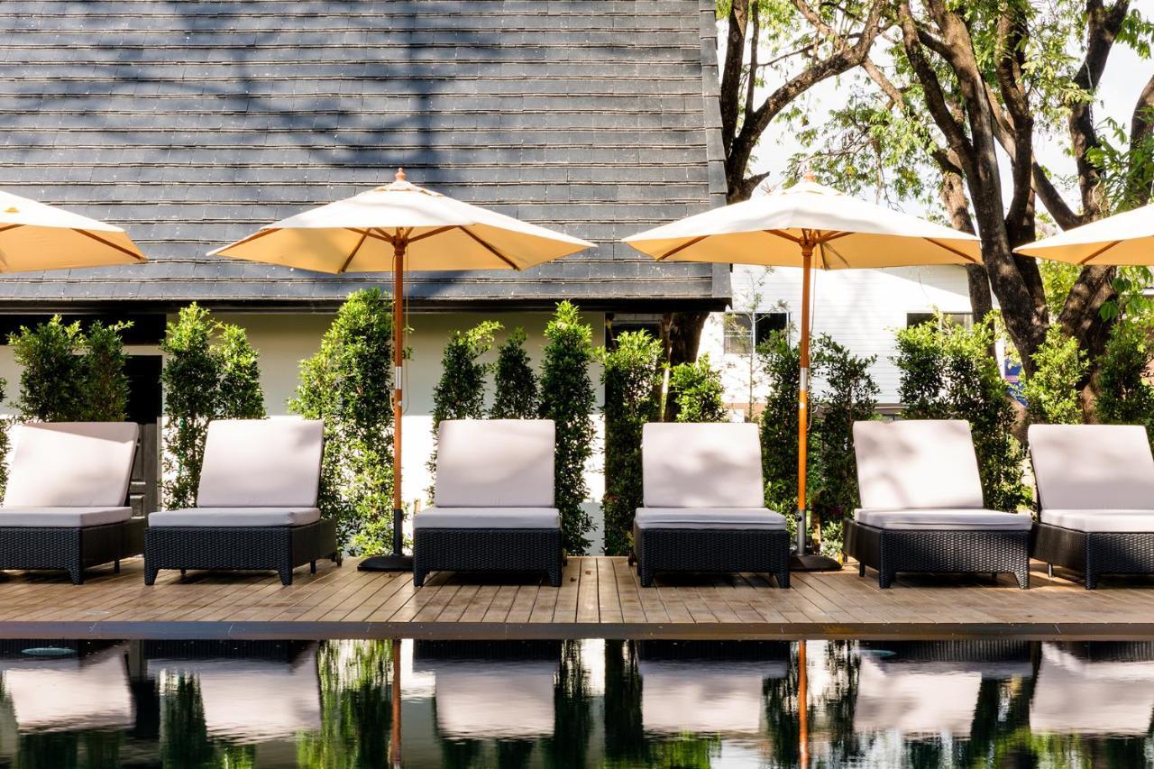 莫拉精品酒店【SHA Extra Plus】 清莱 外观 照片 The pool at the hotel
