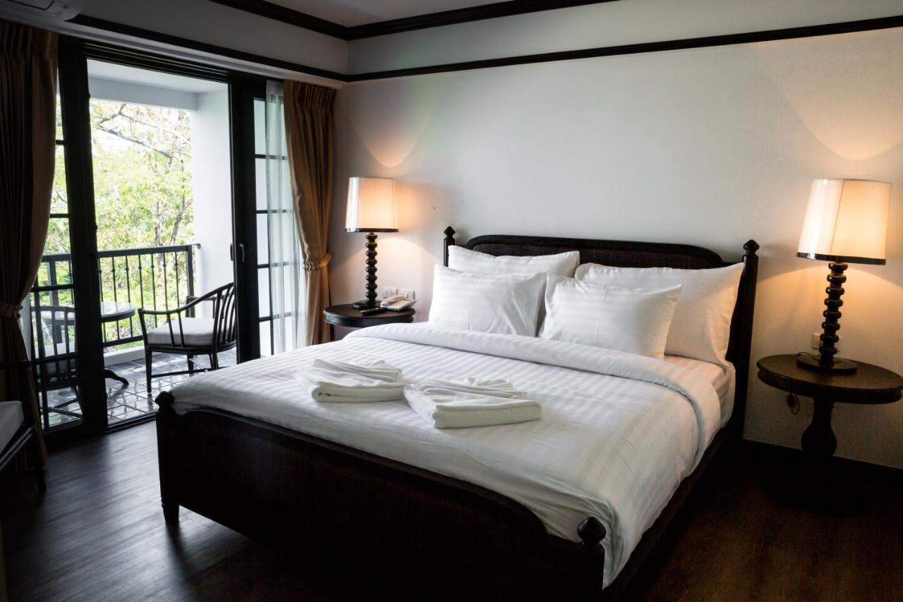 莫拉精品酒店【SHA Extra Plus】 清莱 外观 照片 A bedroom at the hotel