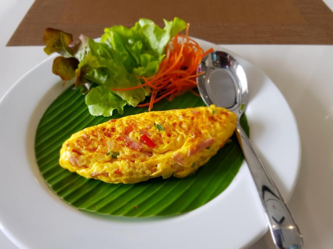 莫拉精品酒店【SHA Extra Plus】 清莱 外观 照片 Thai omelette